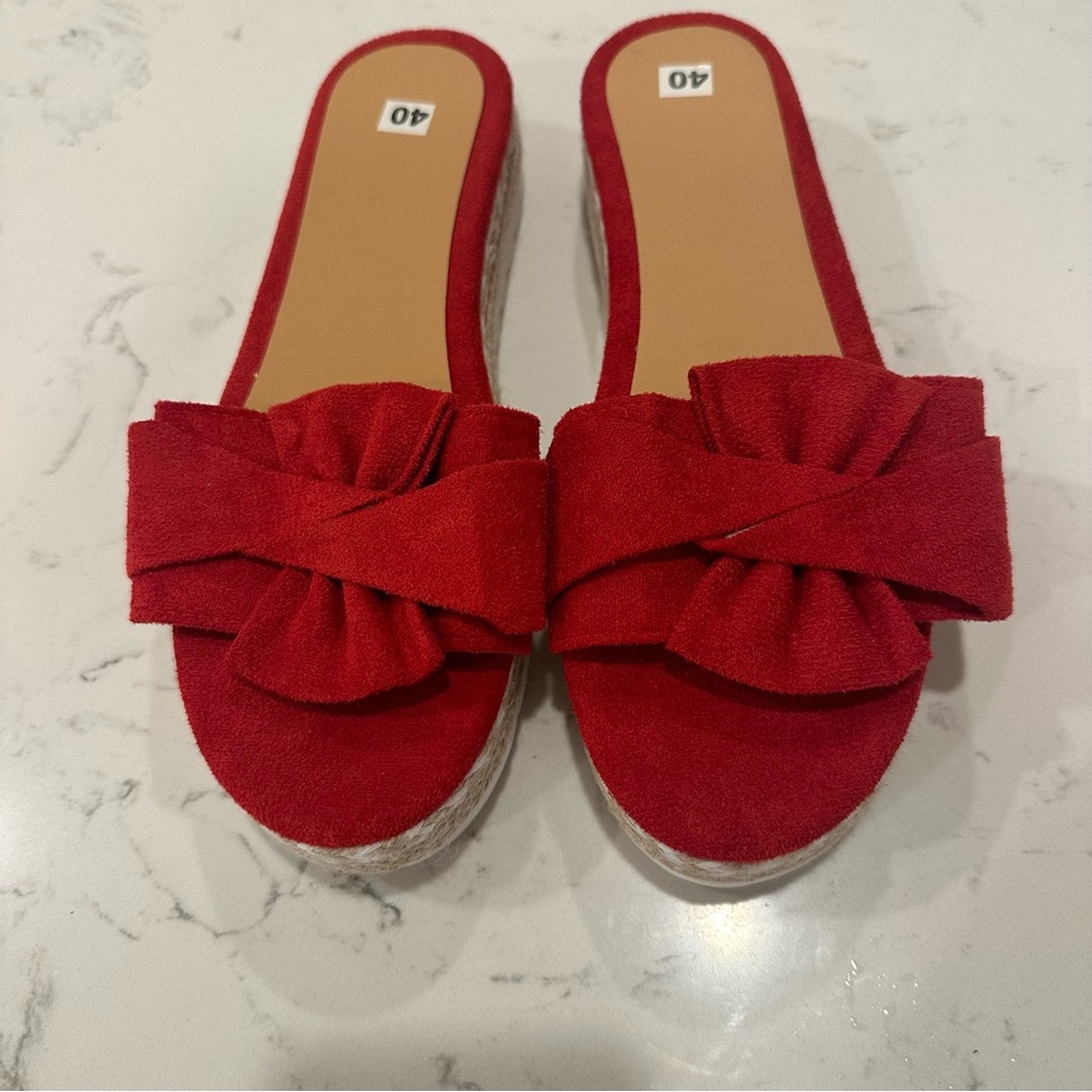 NEW red faux suede slip on sandal size 40 (8). There is no brand listed on them.